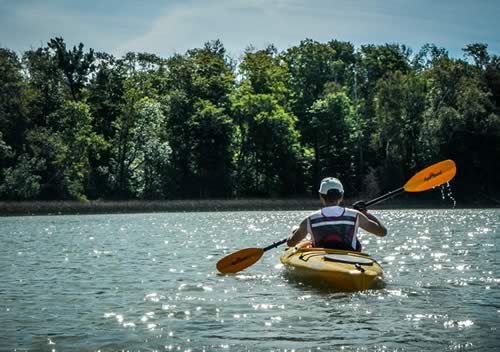 john doe in a kayak